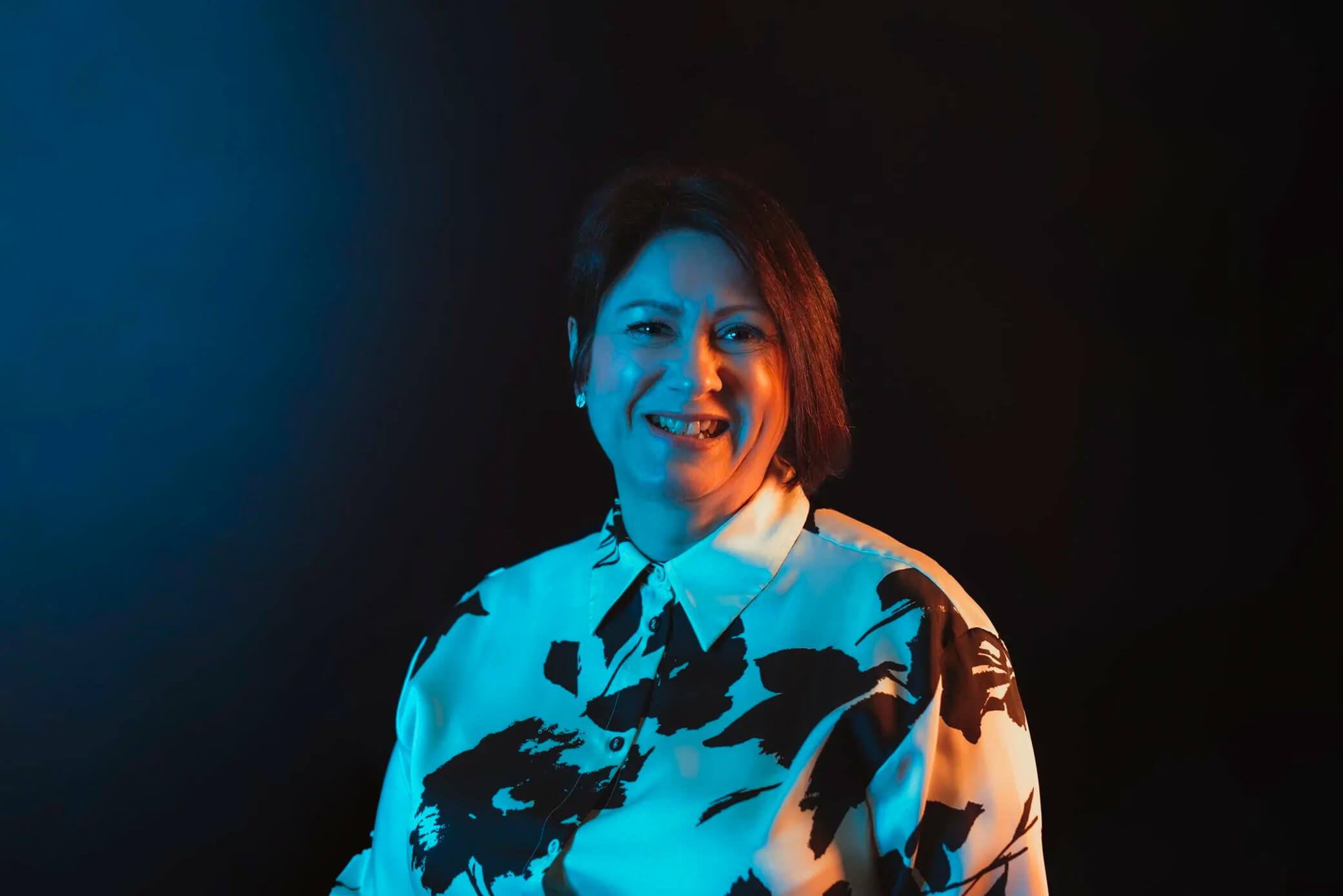 everything tech staff member international women's day with blue gradient background