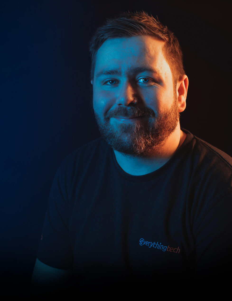 everything tech leadership team member with blue neon background