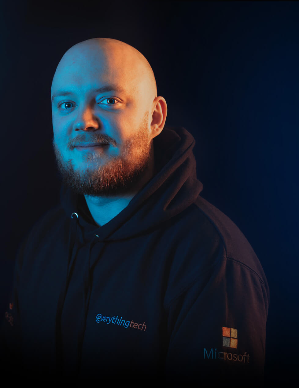 everything tech hero image of staff member for voice and connectivity mobile