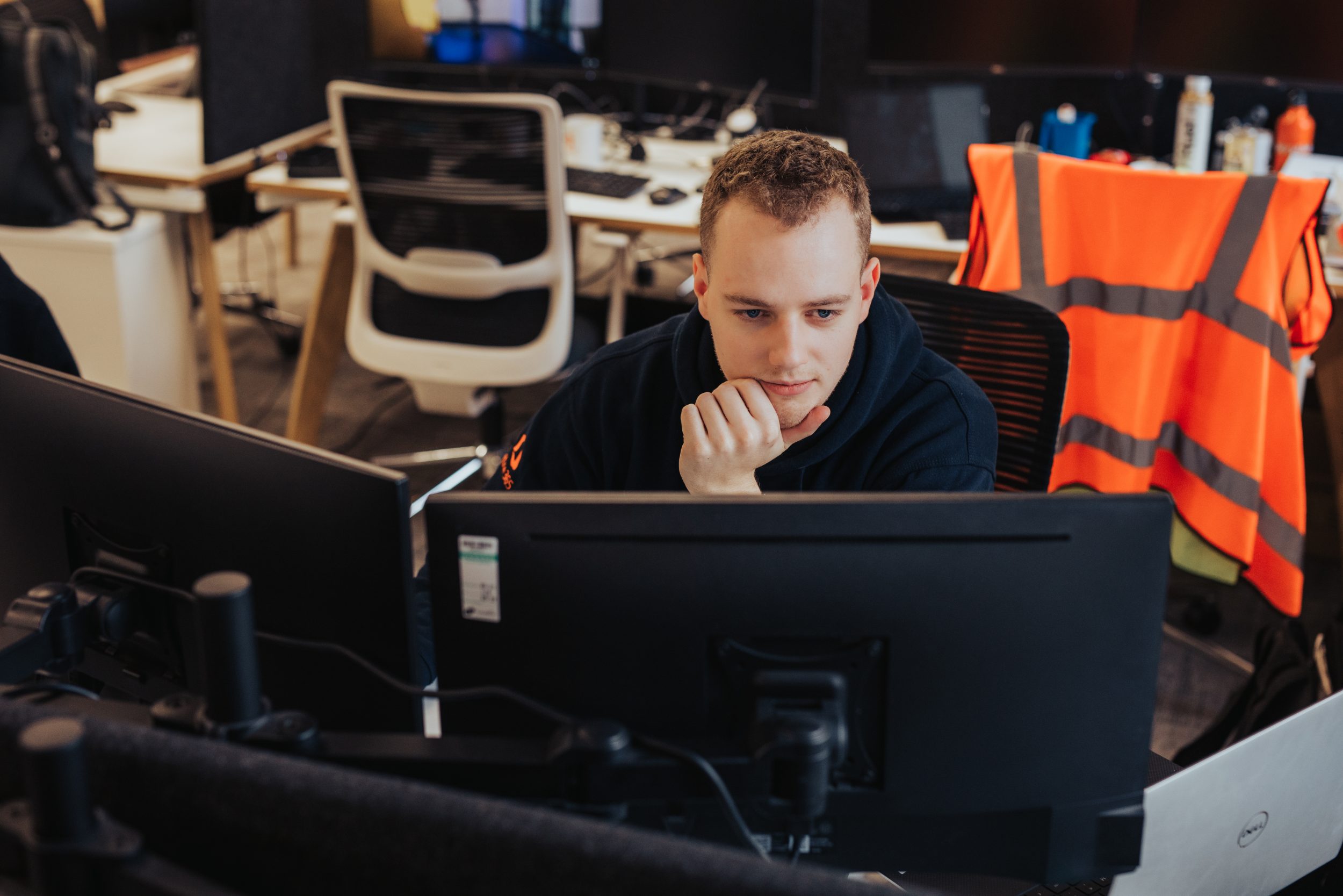 everything tech staff member working on computer