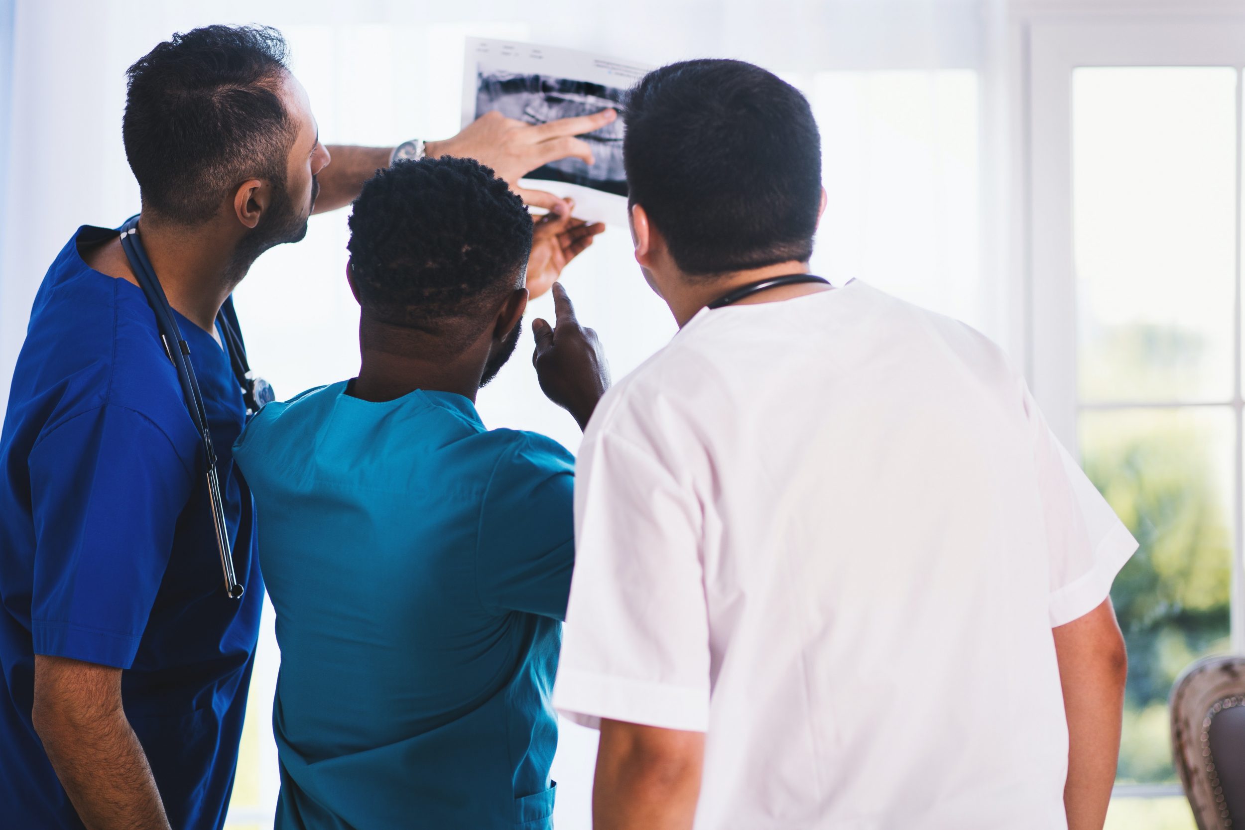 Healthcare staff looking at photo