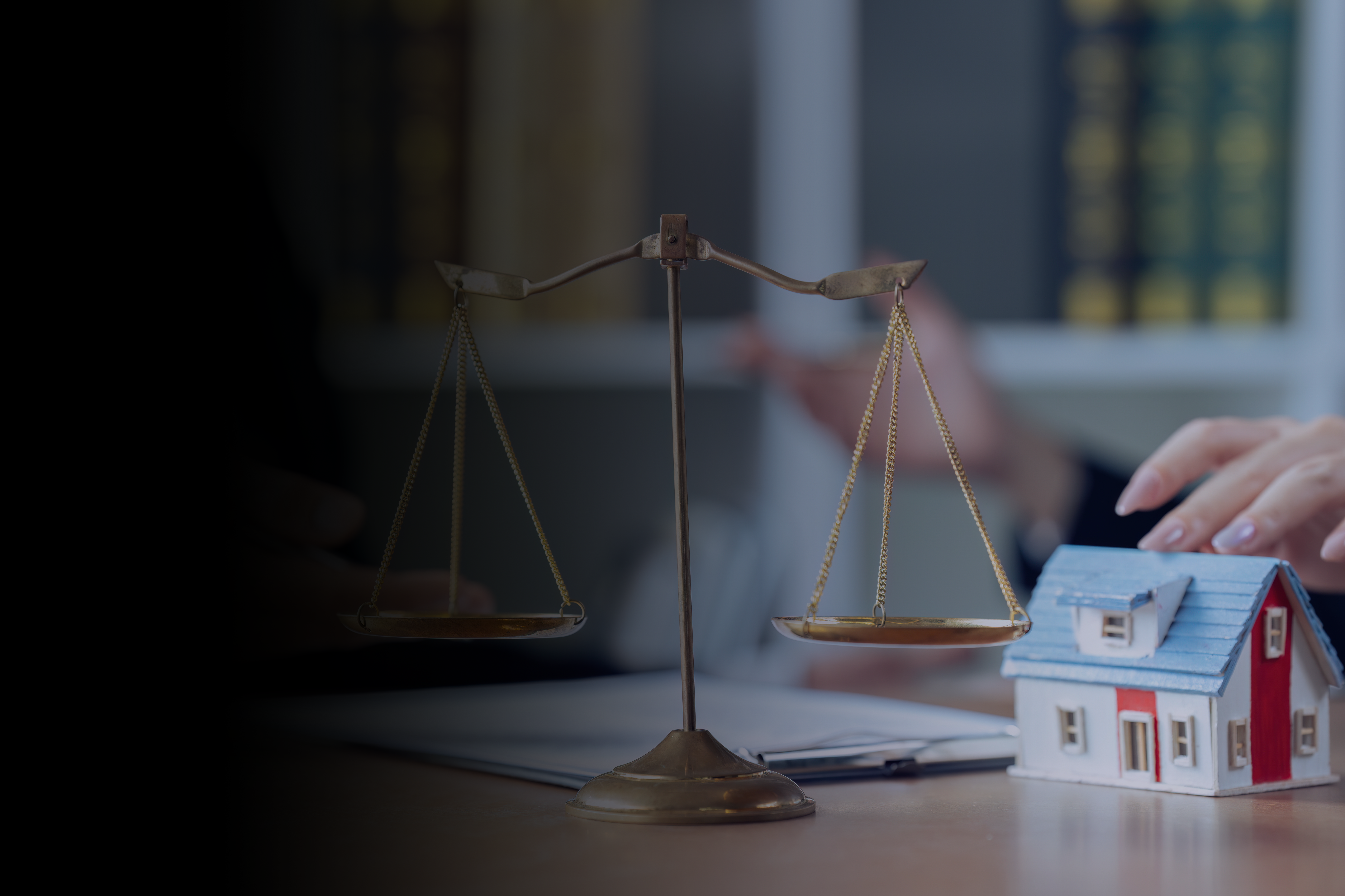 weighing scales image with small house faded